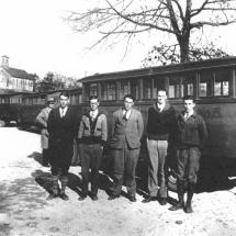 Lewisville School Bus Drivers and Bus, with Lewisville Baptist Church in background, 1927