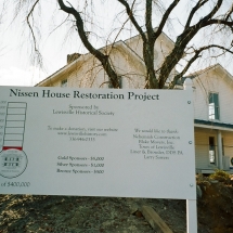 Nissen House at original site with sign. January 1, 2009