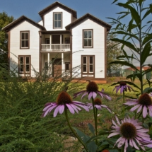 Nissen House with Cone Flowers